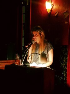 Jennifer Juneau at the Great Weather for Media reading 14 November 2018 kgbbar.com Photo by Anne Weisgerber.