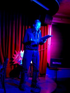 Ron Kolm 3/1/2019 FBomb NYC Flash Fiction Reading Series. Photo Credit: A.E. Weisgerber.